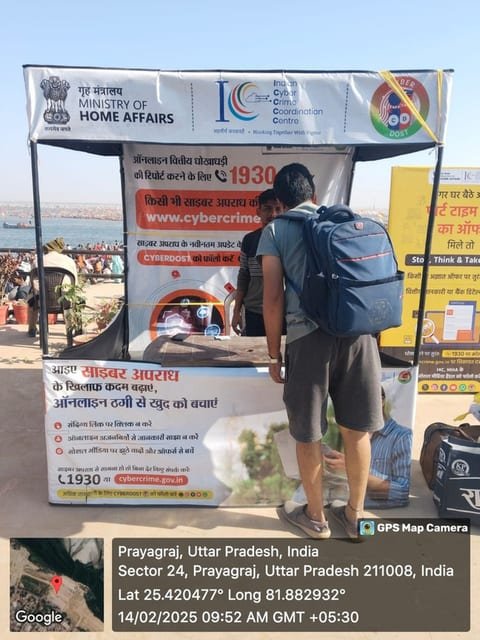 Visitors engaging with cyber safety awareness material