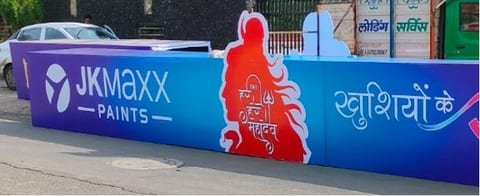 JK Maxx Paints branding along a prime Ujjain location during Sawan