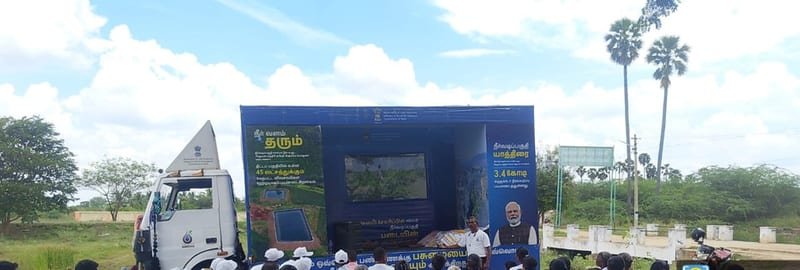 Community members watching a watershed awareness presentation