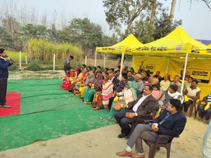 Village leaders being honoured on stage during the campaign