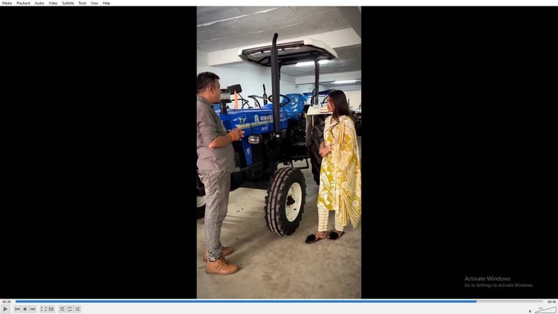 Vertical video still of a New Holland tractor product comparison